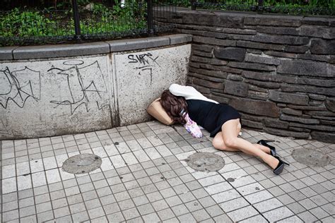 Cumming On. . Passed out girl in street